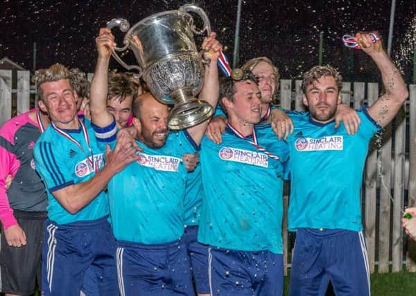 Newlands lift the League Cup. Pictures: Brian Muirfield