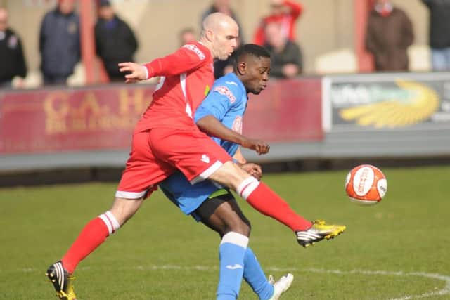 Goalscoring full-back Paul Robson loops one forward