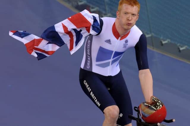 Great Britain's Ed Clancy celebrates winning the Gold medal in the Men's Team Pursuit final at the Velodrome in the Olympic Park, during day seven of the London 2012 Olympics. PRESS ASSOCIATION Photo. Picture date: Friday August 3, 2012. See PA story OLYMPICS Cycling Track. Photo credit should read: Tim Ireland/PA Wire. EDITORIAL USE ONLY