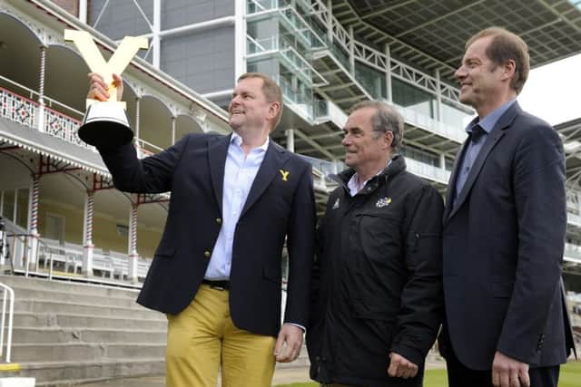 Opening of the Tour de Yorkshire Media Centre  at York Racecourse, pictured with the winners trophy are Gary Verity, Chief Executive of Welcome to Yorkshire, Bernard Hinault  5 times winner of the Tour de France, and Christian Prudhomme: Director of Tour de France, ASO.  30 April 2015.  Picture Bruce Rollinson