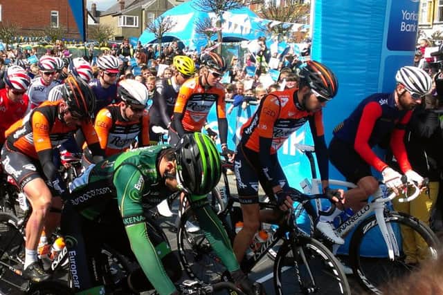 Sir Bradley Wiggins (far right) on the start line.
