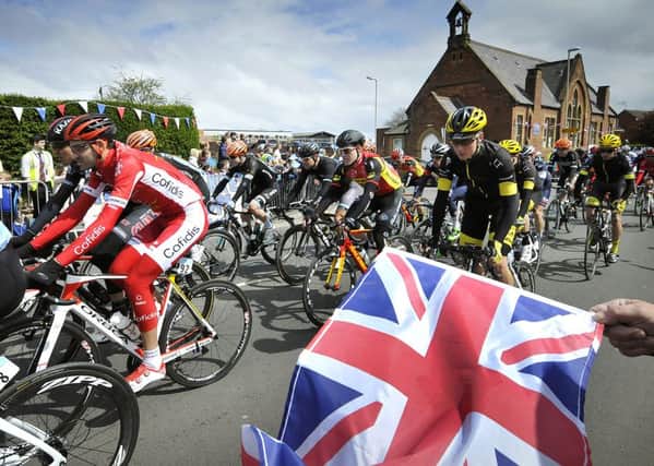 Tour de Yorkshire . The bikes race through Cayton. pic Richard Ponter 151725a