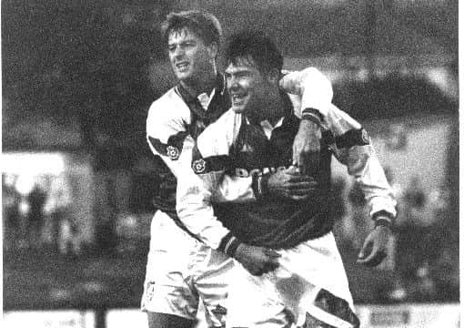 Tommy Mooney and Darren Foreman celebrate the 4-2 win against York
