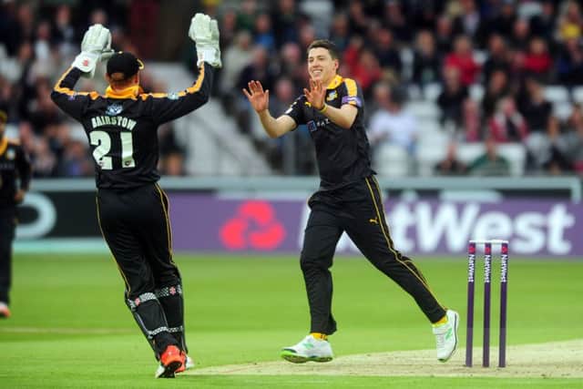 Matt Fisher celebrates taking the wicket of Derbyshire's Chesney Hughes. Picture: Steve Riding.