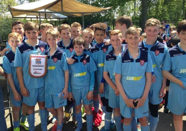 Scarborough Athletic's under-13s celebrate their third-place finish at the Amsterdam Cup