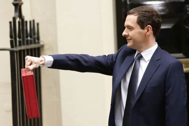 Chancellor of the Exchequer George Osborne outside 11 Downing Street, London, before heading to the House of Commons to deliver his first Tory-only Budget. PRESS ASSOCIATION Photo. Picture date: Wednesday July 8, 2015. See PA story BUDGET Main. Photo credit should read: Yui Mok/PA Wire