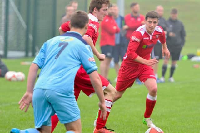 TRIALS --- Football trials for Scarborough Athletic FC. Takes place at Hull University Scarborough Campus, Scarborough. // Prospective players in a game trying to impress the Athletic bosses. Saturday 4th July 2015. HARRY ATKINSON