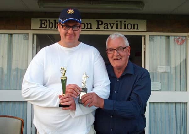 Man Of Match William Wood, left, collects his trophy from league vice president Bob Cowton, right, 152035a