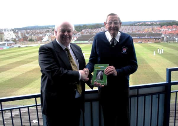 Pictured in 2010, former Scarborough and Yorkshire bowler Bill Foord (right) presents his book to Scarborough Cricket Club chairman Bill Mustoe.