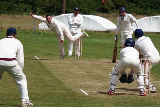 Wykeham 2nds bowler Steve Day sends one down the Muston wicket. Picture: Steve Lilly (152038g)