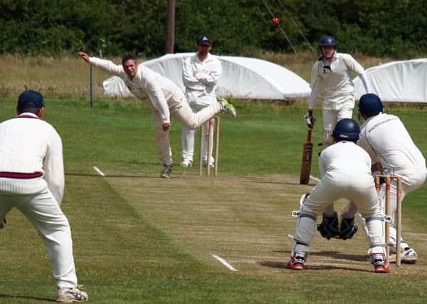 Wykeham 2nds bowler Steve Day sends one down the Muston wicket. Picture: Steve Lilly (152038g)