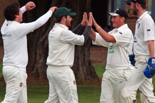Muston 2nds celebrate a wicket in their defeat against Ganton 2nds.