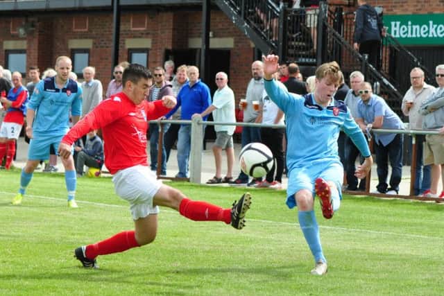 Boro's Dan Clayton tries to whip the ball past Matty Griffiths during the 1-1 draw     Picture by Andy Standing