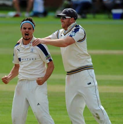 Jack Brooks celebrates a wicket