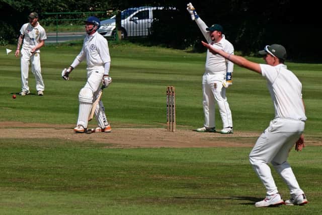 Flixton make an unsuccessful appeal for LBW 152047a