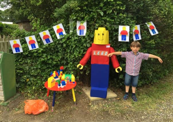Harry Amstell with his prized scarecrow - but cruel thieves have left the six-year-old heartbroken