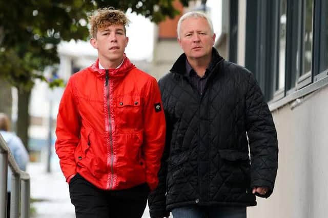 Christopher Backhouse supported by his dad Andrew in court