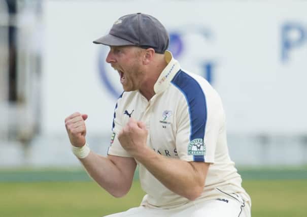 Captain Andrew Gale celebrates taking the catch to dismiss Jack Burnham and complete victory for Yorkshire over Durham (Picture: Allan McKenzie/SWpix.com).