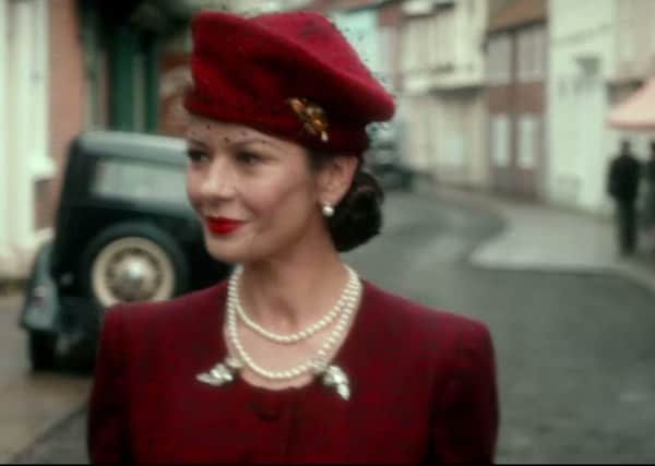 Catherine Zeta-Jones as journalist Rose Winters walks along Bridlington's High Street