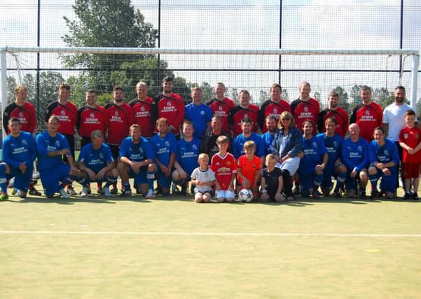 Teams ready to play in the Joe Greening Memorial Football match. Picture Kathryn Bulmer