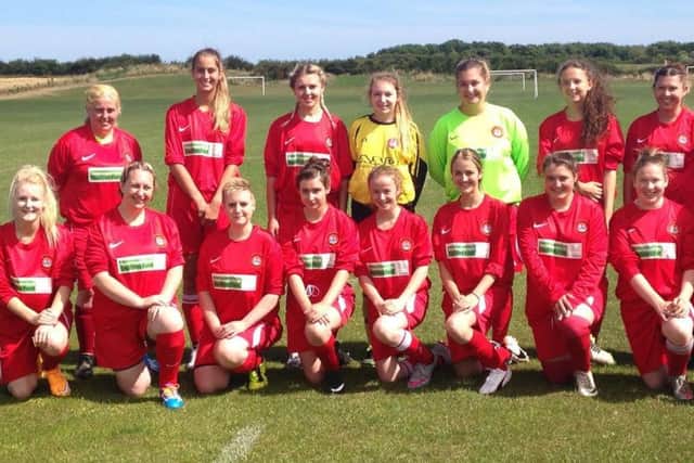 SLFC's open age side line up before their first-ever game. Picture submitted.