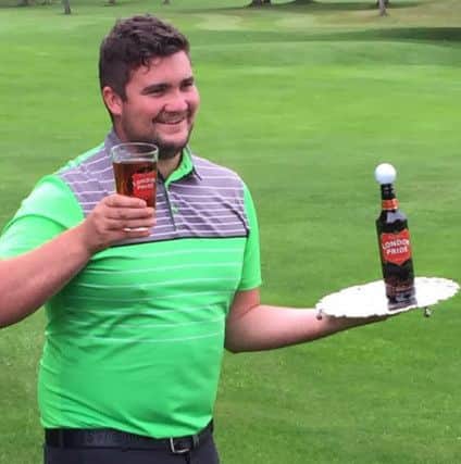 Morris celebrates his success with a pint of Fullers London Pride