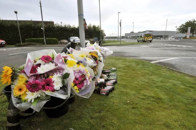 The shrine to tragic Danny at the crash site in Dunslow rd Rta outside Kia Motors. pic Richard Ponter 153601a