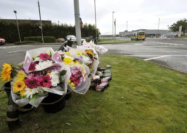 The shrine to tragic Danny at the crash site in Dunslow rd Rta outside Kia Motors. pic Richard Ponter 153601a