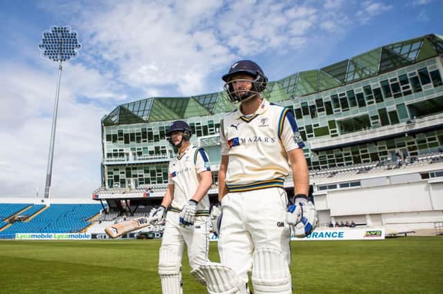 Picture by Alex Whitehead/SWpix.com - 10/05/2015 - Cricket - LV County Championship Div One - Yorkshire CCC v Hampshire CCC, Day 1 - Headingley Cricket Ground, Leeds, England - Yorkshire's Adam Lyth (near) and Alex Lees walk out to bat at the start of play.