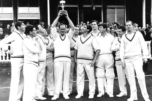 Brian Close holds the
Gillette Cricket Cup trophy after winning in 1965.