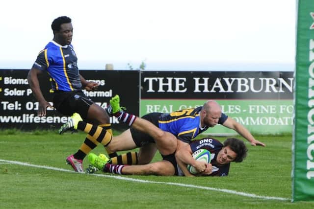 Tom Harrison touches down in Scarborough's win against West Park Leeds. Picture: Andy Standing