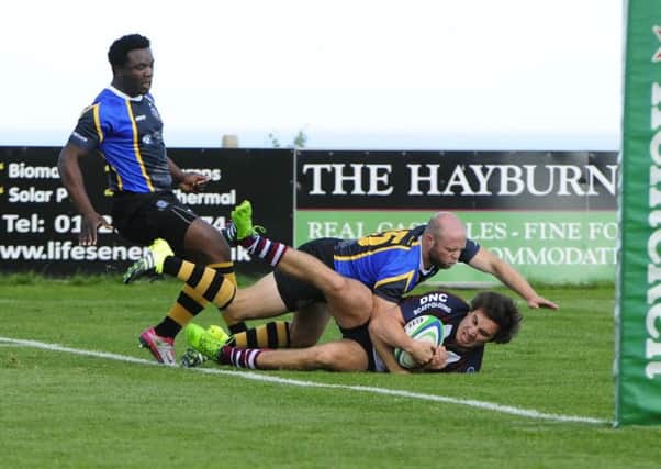 Tom Harrison touches down in Scarborough's win against West Park Leeds. Picture: Andy Standing