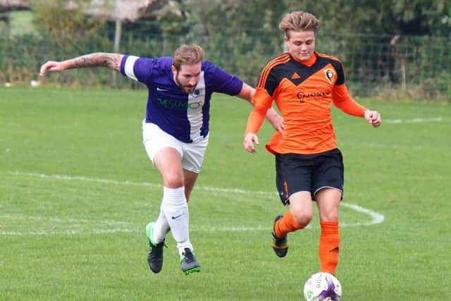 Edgehill's Jackson Jowett runs at the Unicorn defence during their eight-goal thriller at Staxton. Pictures: Steve Lilly