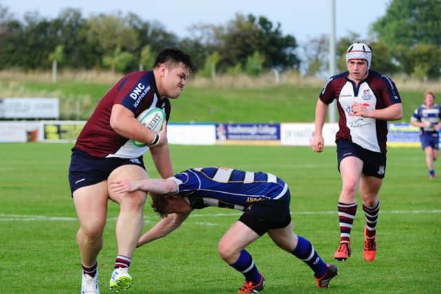 Wesley Langkilde looks to shrug off a Yarnbury challenge during the 28-12 win. Picture: Andy Standing