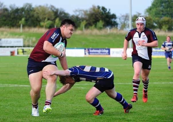 Wesley Langkilde looks to shrug off a Yarnbury challenge during the 28-12 win. Picture: Andy Standing