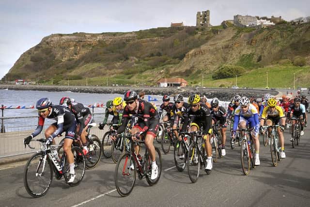The cyclists ride to the finish at Scarborough's North Bay in the 2015 Tour de Yorkshire