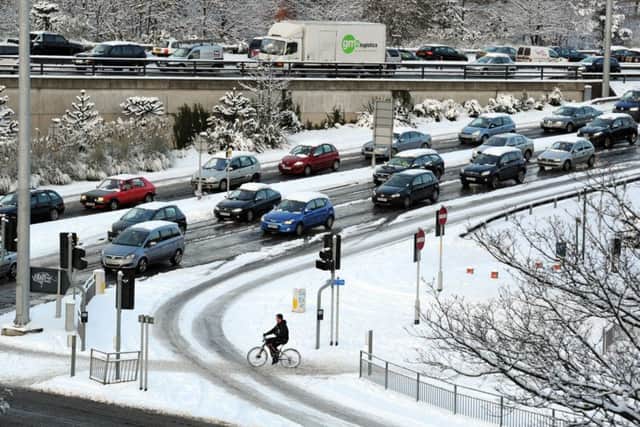 Traffic queues near a snowy Wellington Street in Leeds during 2010.