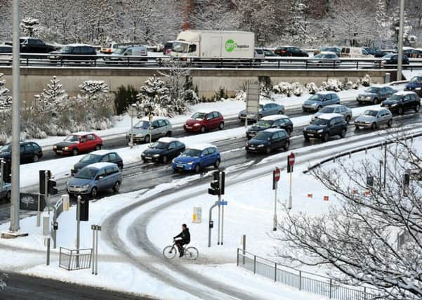 Traffic queues near a snowy Wellington Street in Leeds during 2010.