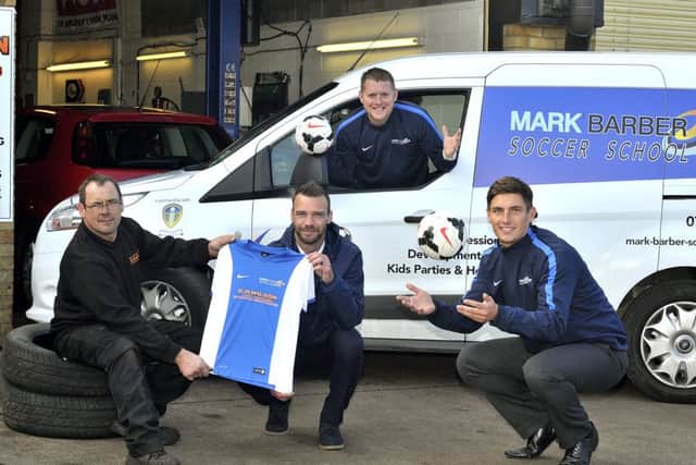 Keith Wilson, left, shows off one of the new sponsored shirts with Mark Barber, back, Denny Ingram and Tony Hackworth Picture by Richard Ponter 154120
