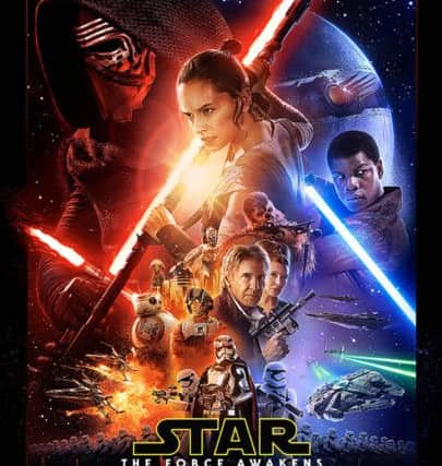 Undated handout photo taken from the Official Star Wars website of the theatrical poster of the new Star Wars film, The Force Awakens.  Star Wars fans are to be treated with a new trailer and advance tickets two months before the hotly-anticipated film hits cinemas. PRESS ASSOCIATION Photo. Issue date: Monday October 19, 2015. See PA story SHOWBIZ StarWars. Photo credit should read: Disney/Lucasfilm Ltd/PA Wire

NOTE TO EDITORS: This handout photo may only be used in for editorial reporting purposes for the contemporaneous illustration of events, things or the people in the image or facts mentioned in the caption. Reuse of the picture may require further permission from the copyright holder.