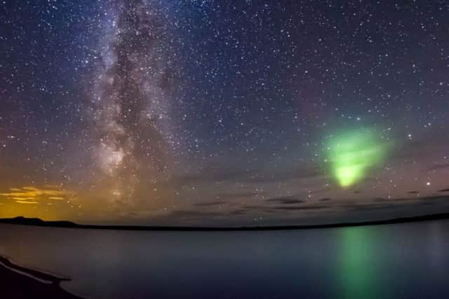 The milky way along with the Aurora shooting in, from the banks of Loch More in Caithness, Scotland. Picture: Ross Parry Agency