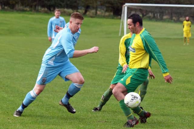 Scalby striker Mikey Hartnett gets on the ball against Duchess. Picture: Steve Lilly