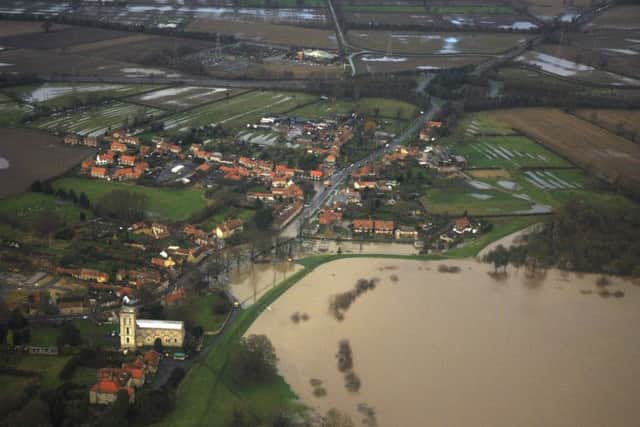 Library picture showing flooding in Old Malton looking towards the A64