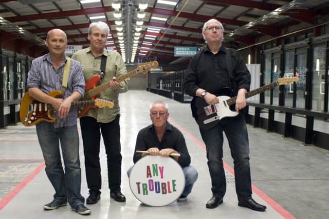Any Trouble with frontman Clive Gregson, right.