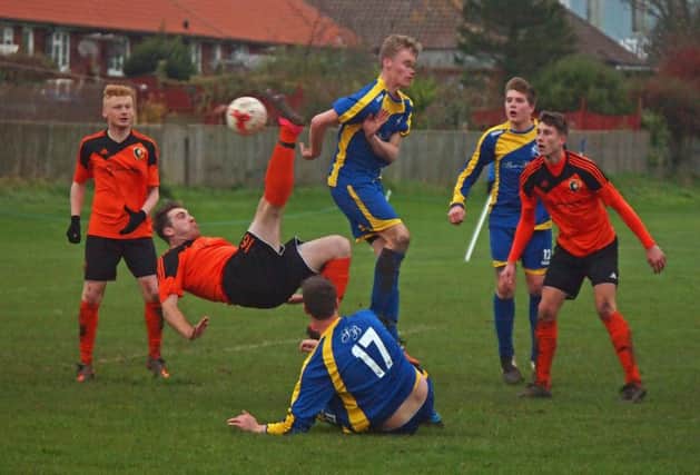 Danny Collins attempts an overhead-kick during Edgehill's 2-2 draw at Filey Town. Picture: Steve Lilly