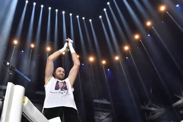 Tyson Fury celebrates beating Wladimir Klitschko and becoming heavyweight champion of the world