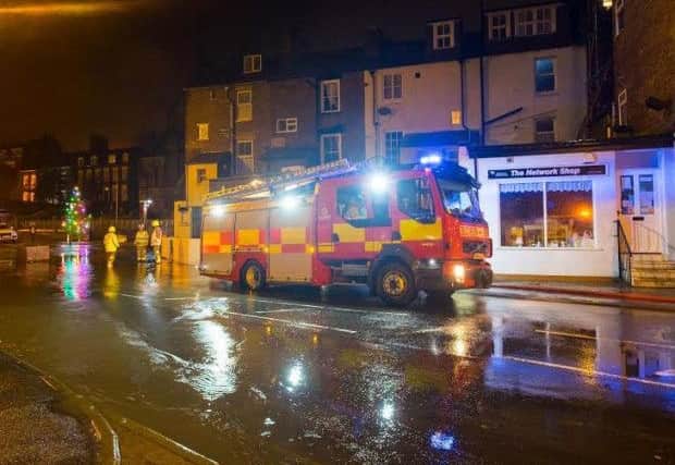Fire crews tackle the flooding in Whitby last night. (Picture: Glenn Kilpatrick - www.whitby-photography.com)