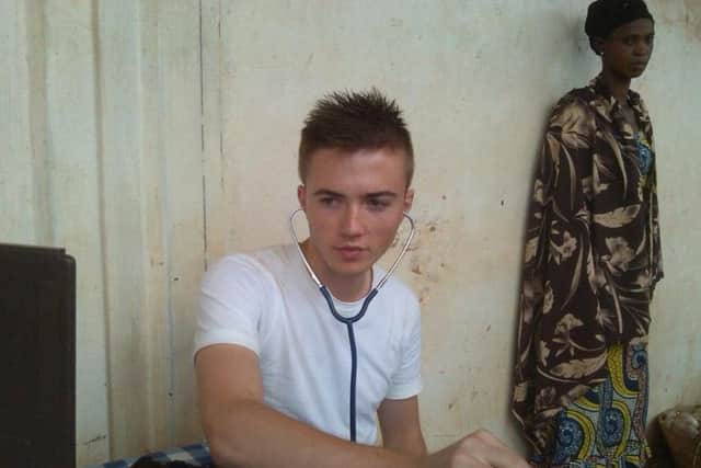 Scarborough College student James Scott working in a clinic in Ghana.