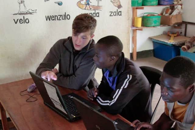 Scarborough College student at work at a school in Malawi.
