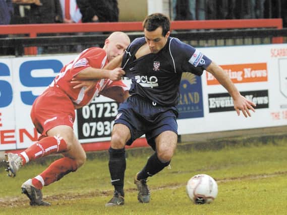 Dave Merris battles with Scarborough FC's Ashley Lyth during his time at York City